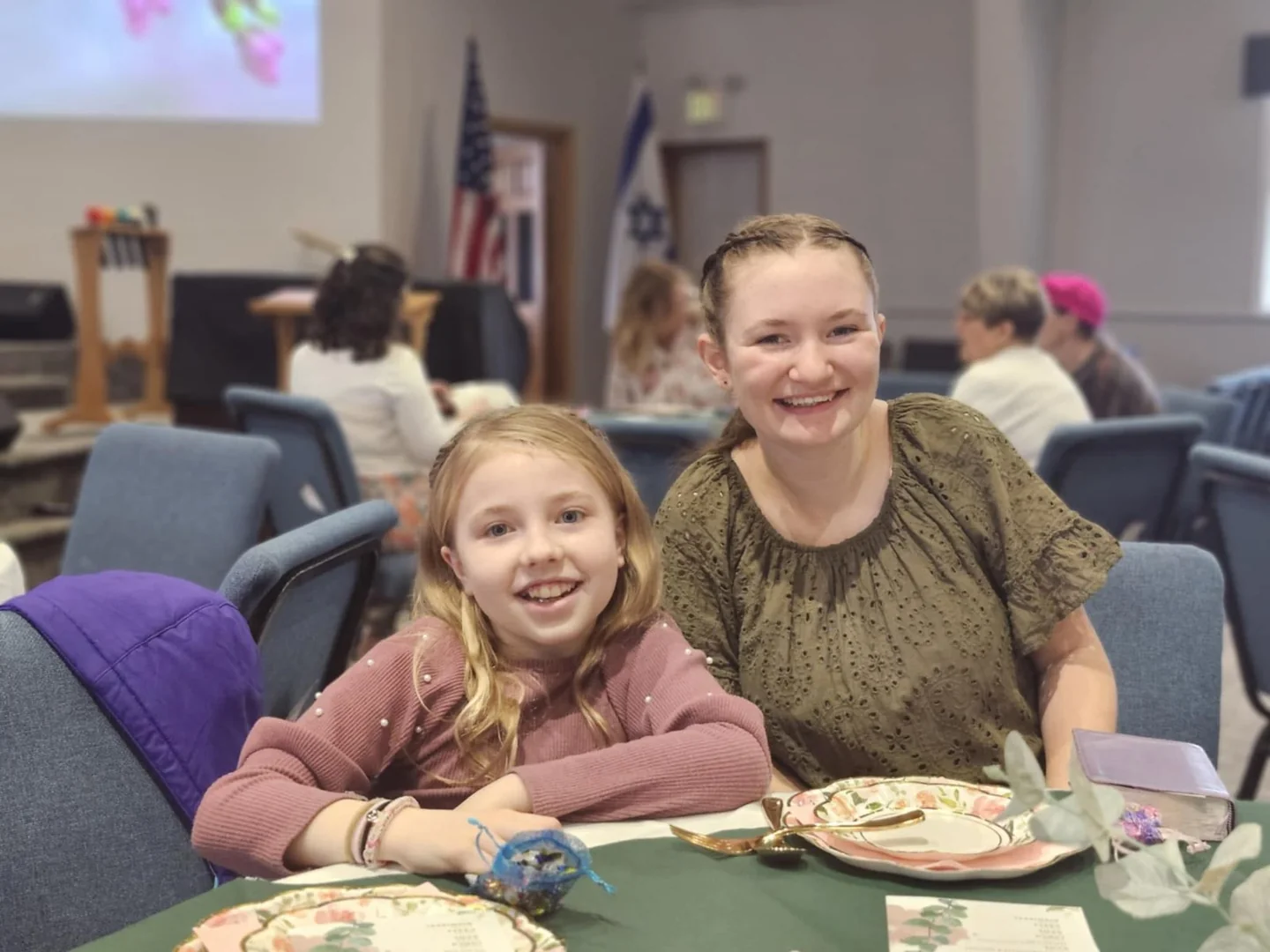 Young people sharing a meal at a church gathering.